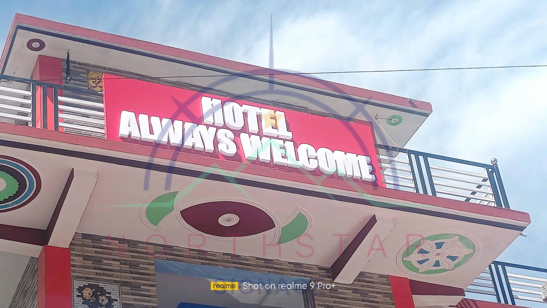 Hotel-Always-Welcome-Signage